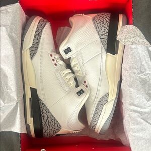 White and Gray Sneakers with Red Accents